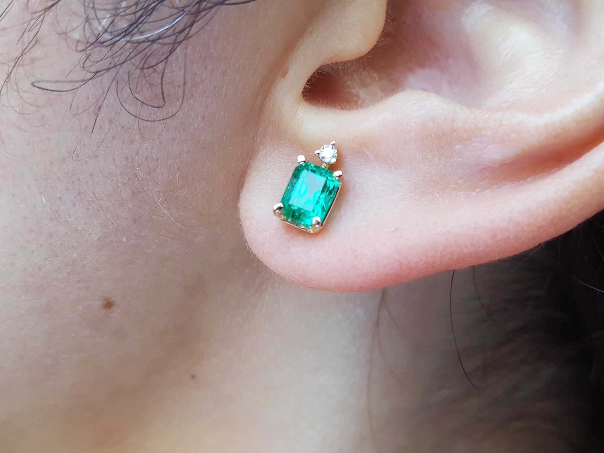 Emerald and diamond stud earrings