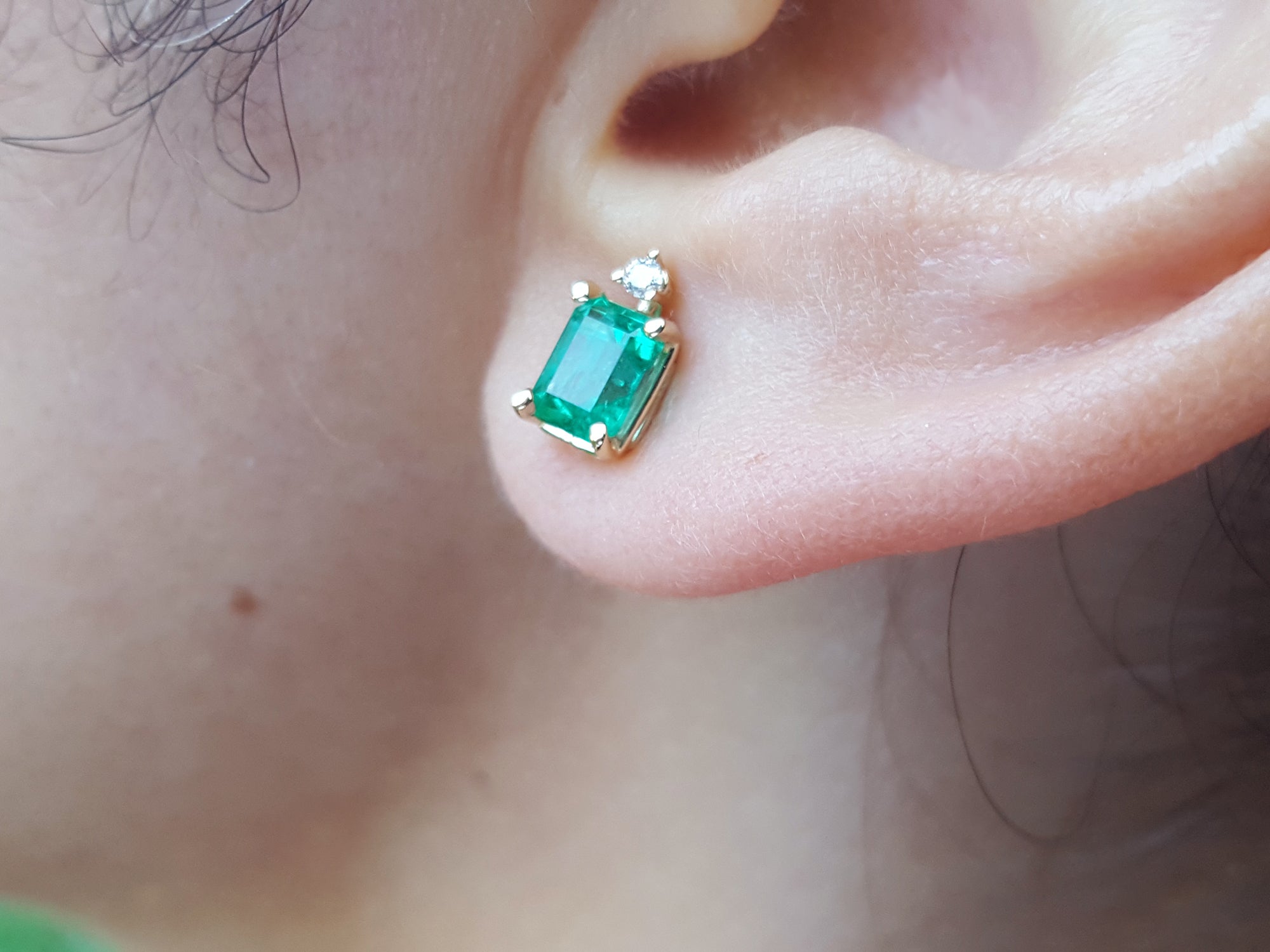 Emeral-cut emerald stud earrings