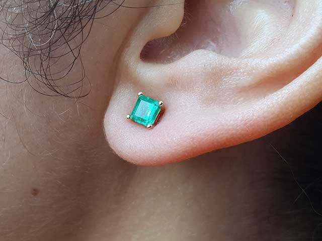 Solid 14k emerald stud earrings yellow gold