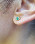 Hexagonal emerald stud earrings 