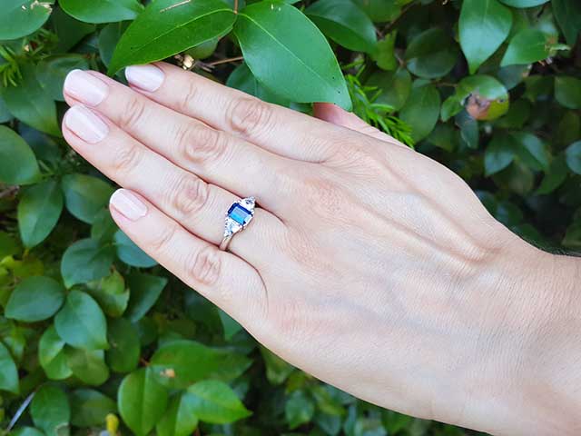 Emerald cut blue sapphire ring