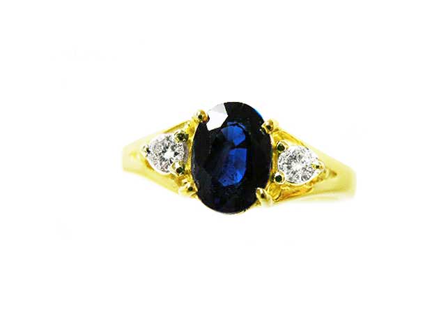 Oval cut blue sapphire ring