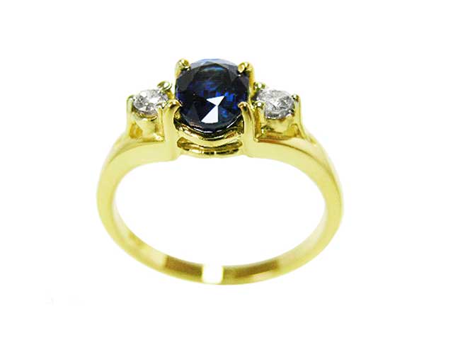Solid white gold ring with sapphires