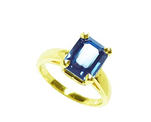 Solitaire emerald cut sapphire ring