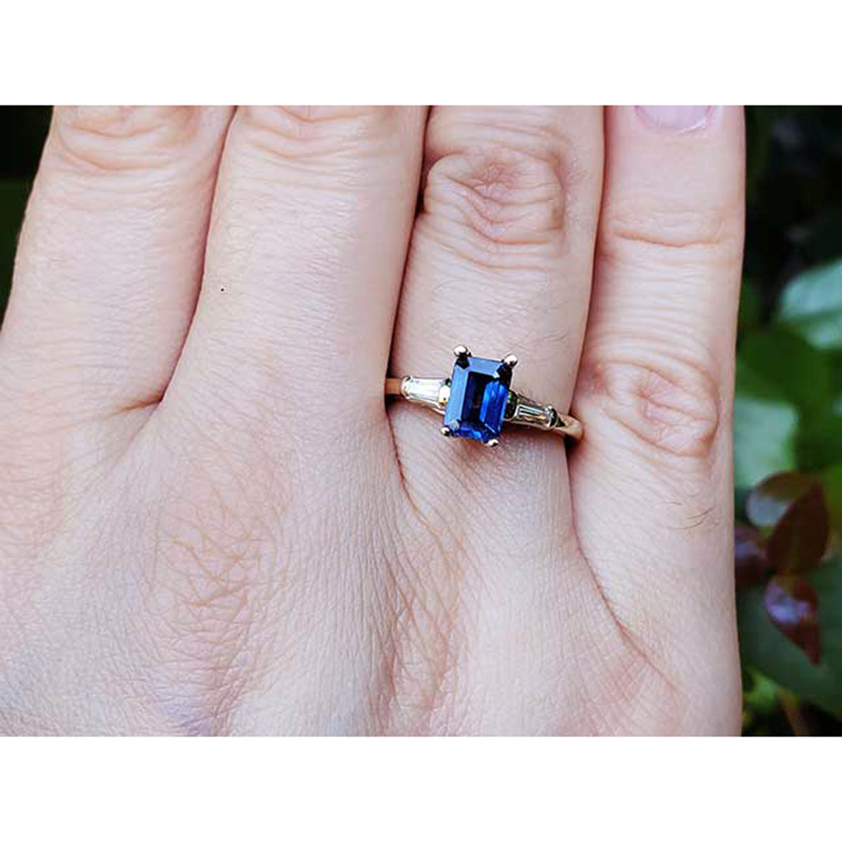 1.13 ct. Women&#39;s Blue Sapphire Three Stone Ring Side Tapered Baguette Diamonds 14K Yellow Gold