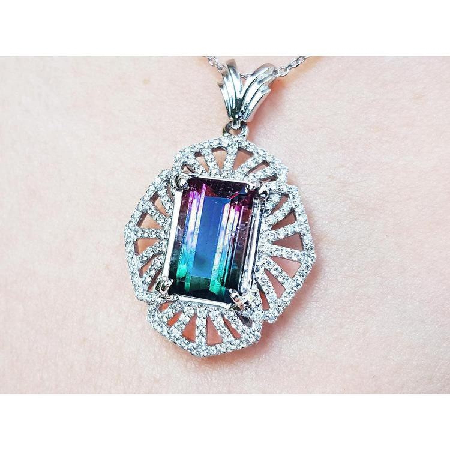 4.90 ct. watermelon tourmaline pendant, emerald cut, with diamonds on 14K white gold chain.