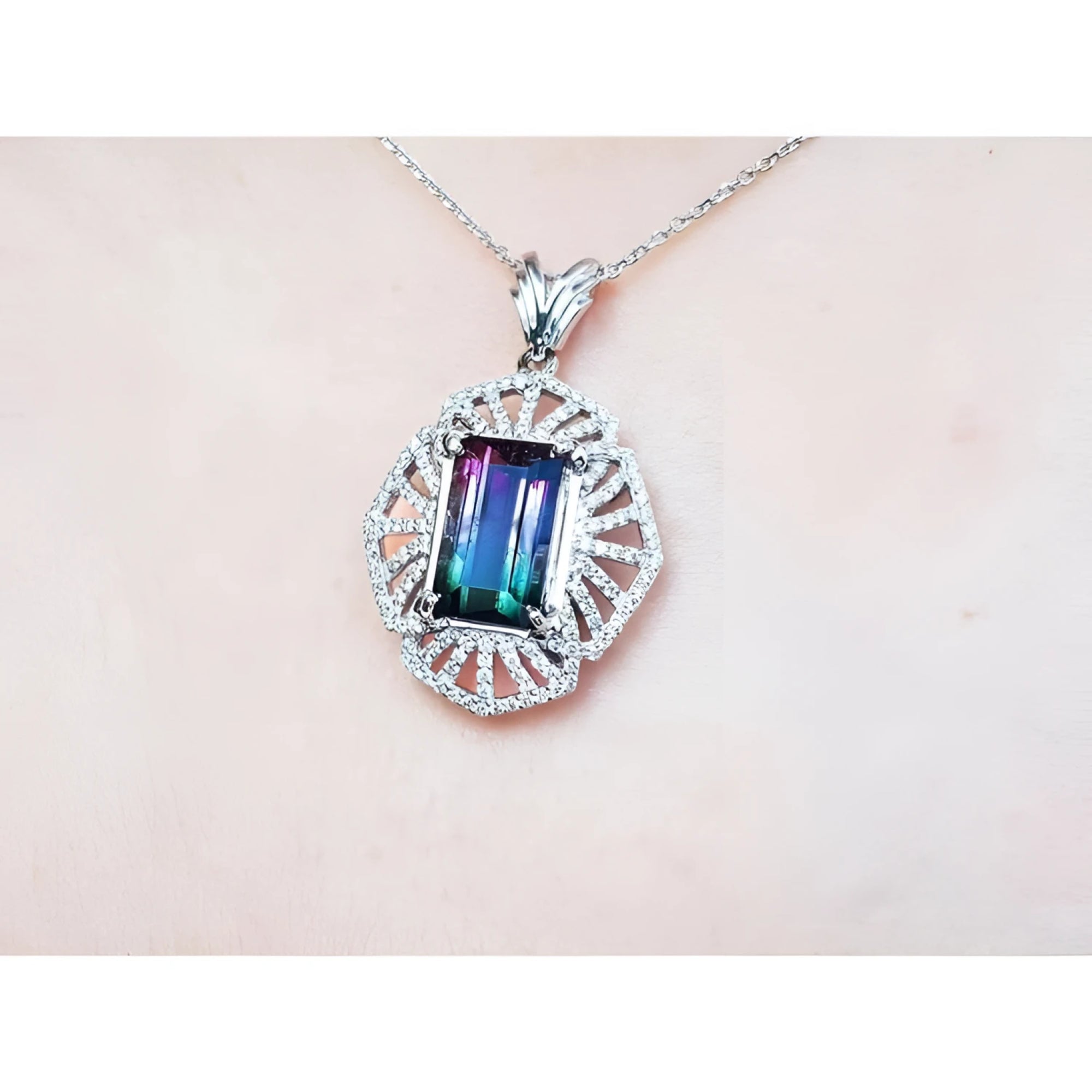 4.90 ct. rectangular watermelon tourmaline pendant with diamonds on a 14K white gold necklace.