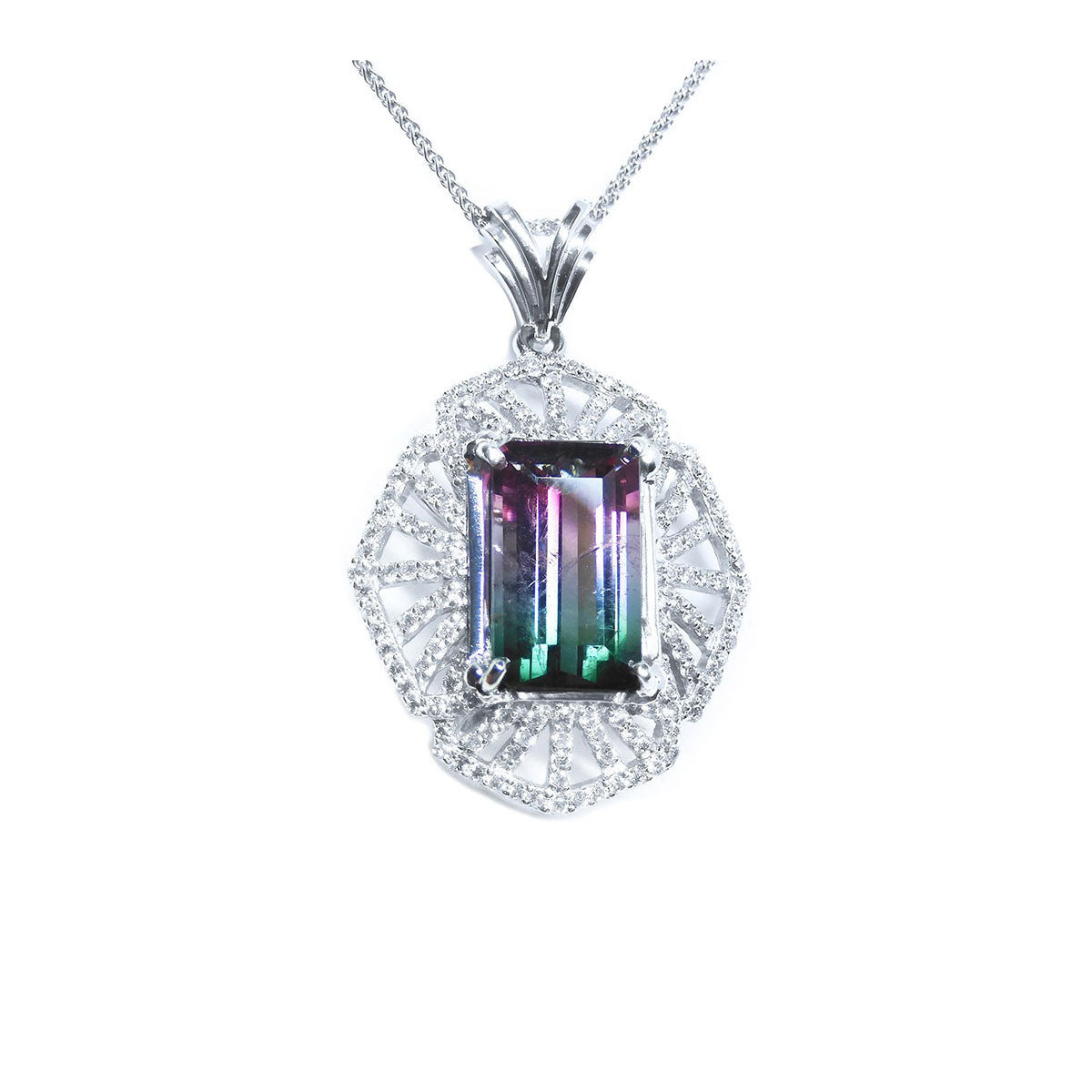 A natural brazilian watermelon tourmaline set in a white gold and diamonds design