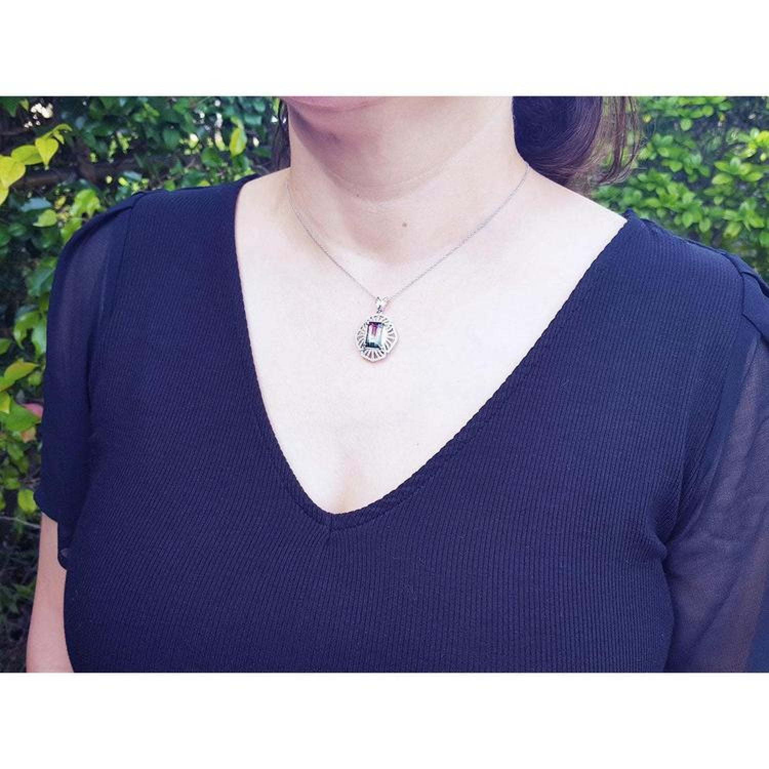 Watermelon tourmaline pendant necklace with rectangular emerald cut, bluish green and pink, 14K white gold.