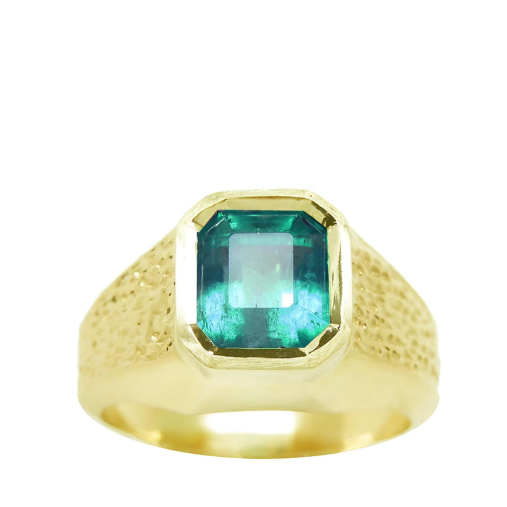 A collection of genuine colombian emerald rings for men in gold.
