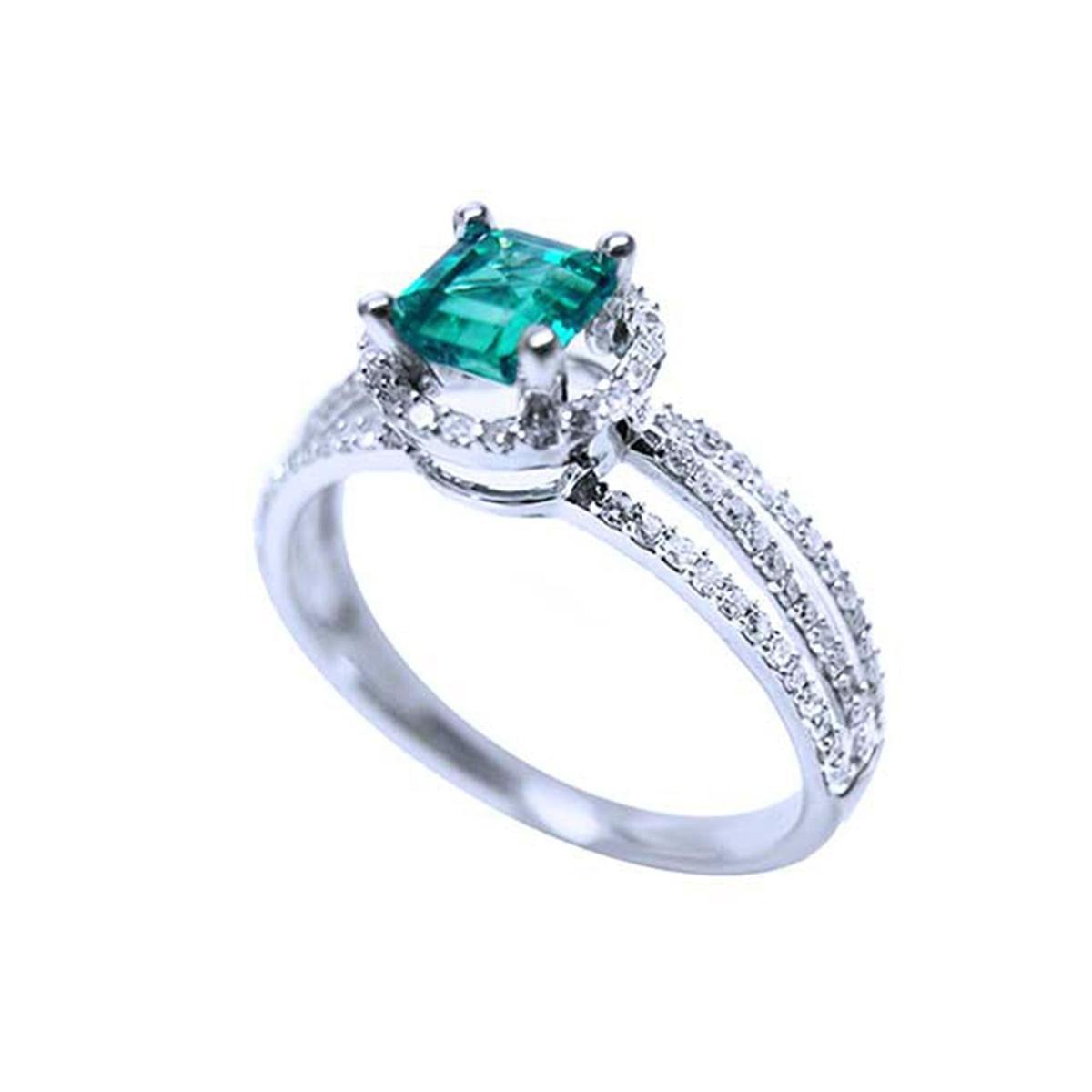 An affordable emerald engagement ring side profile view.