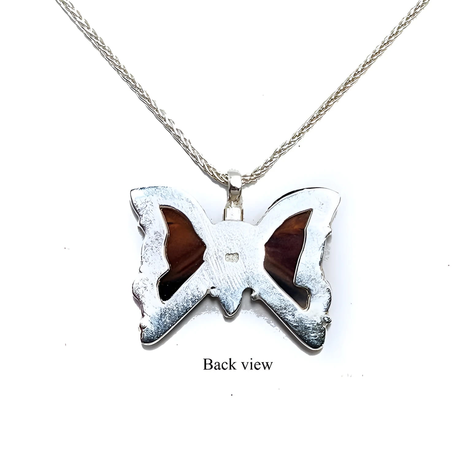 Back view of a sterling silver butterfly pendant necklace with orange, brown, and black agate.