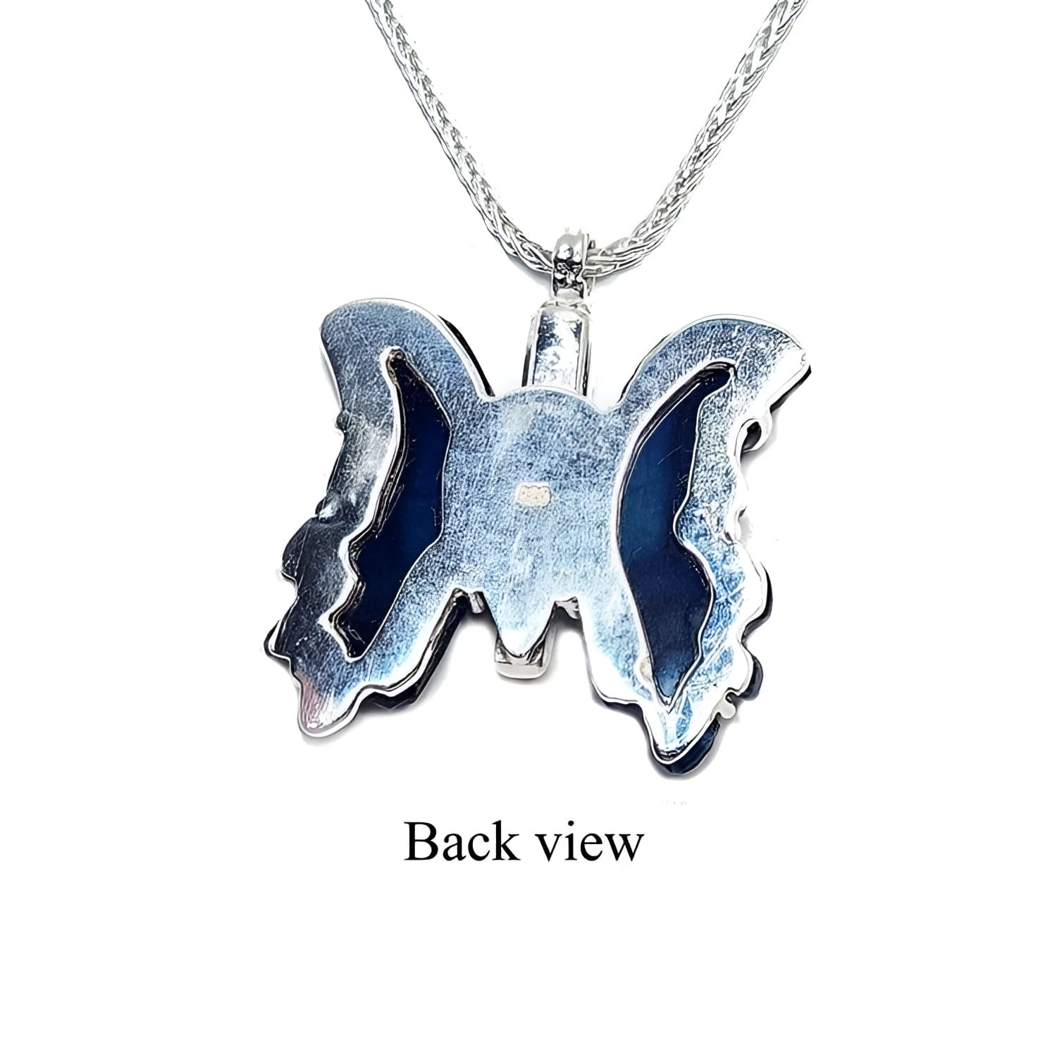 Back view of dark blue natural agate butterfly pendant in sterling silver.
