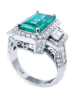 Anillo con esmeralda en oro blanco