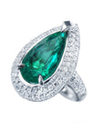 Anillo con esmeralda y diamantes para dama en oro blanco