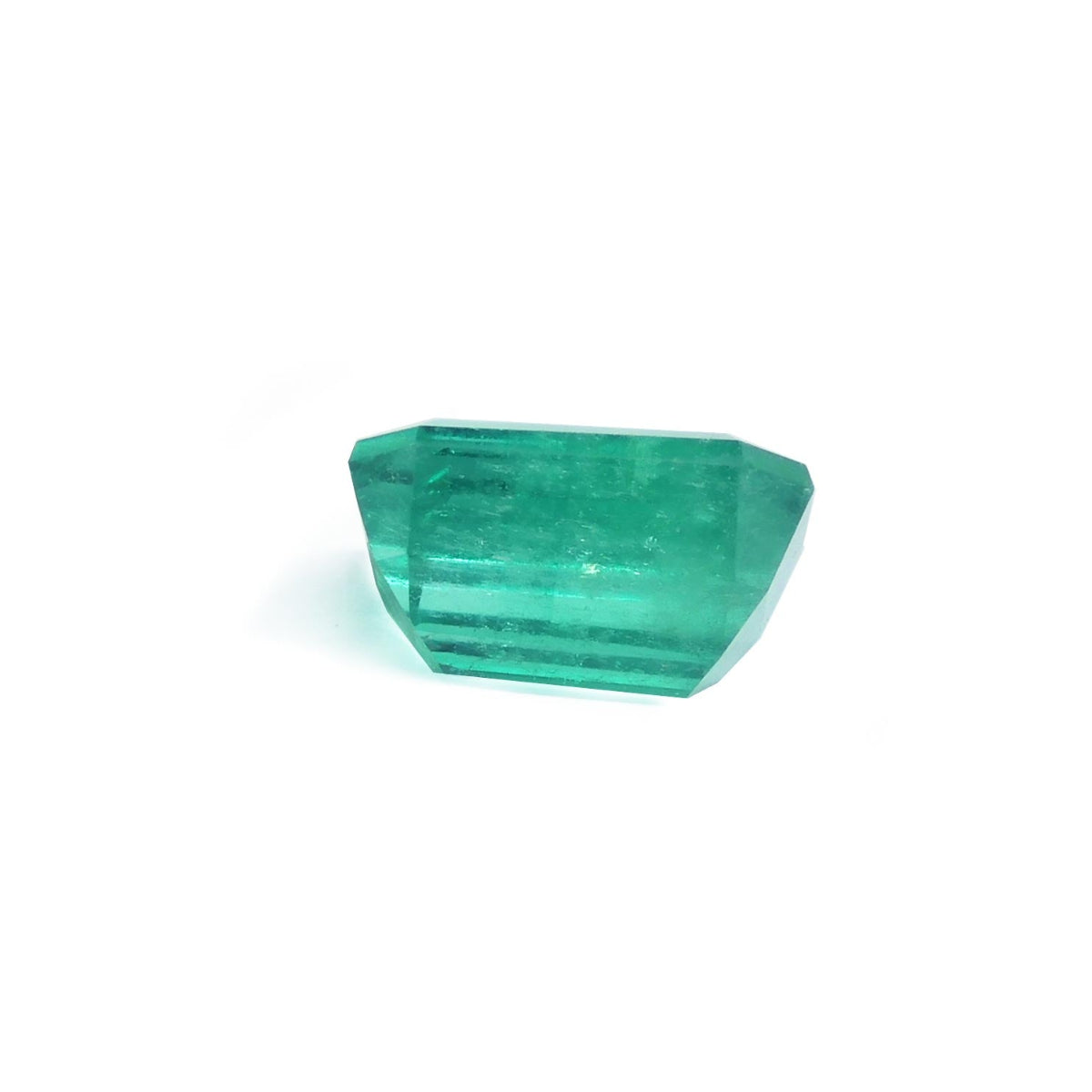 Square Muzo mine loose colombian emerald, underside girdle and pavilion visibles