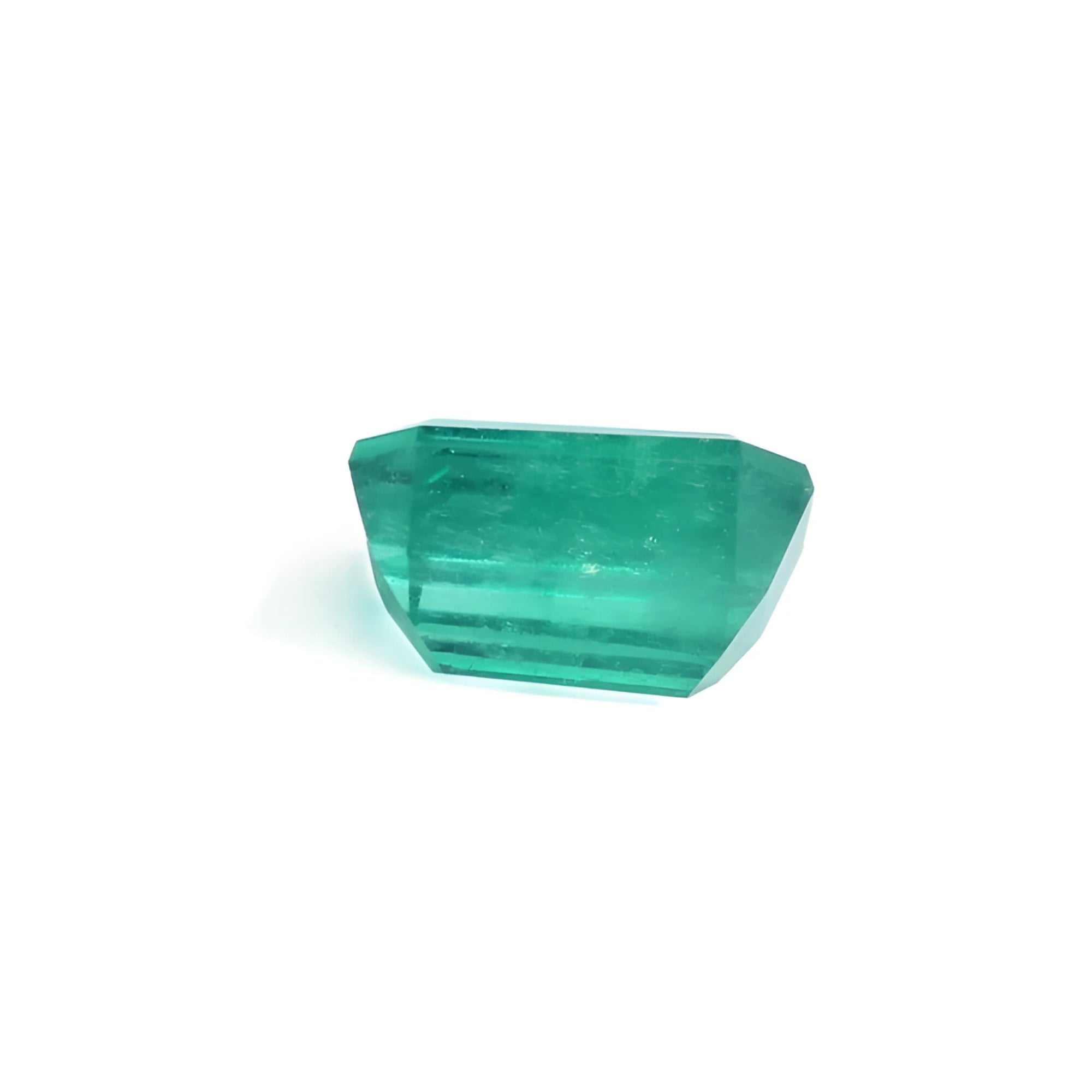 2.95 carat Muzo Mine emerald-cut Colombian emerald with vibrant medium green color.