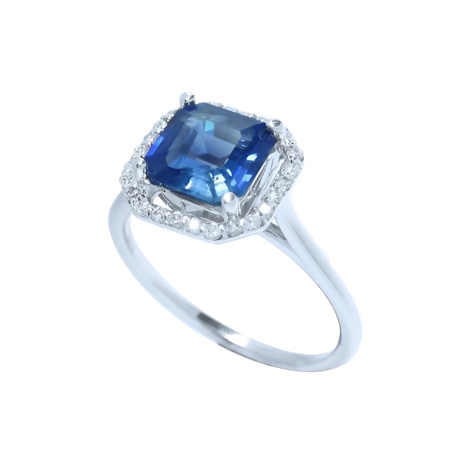 Asscher cut blue sapphire ring with halo diamonds in 18k white gold.