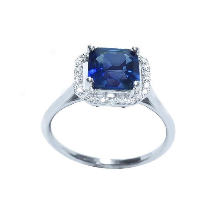 Asscher cut blue sapphire ring for women halo diamonds 18k white gold, half tall down profile view