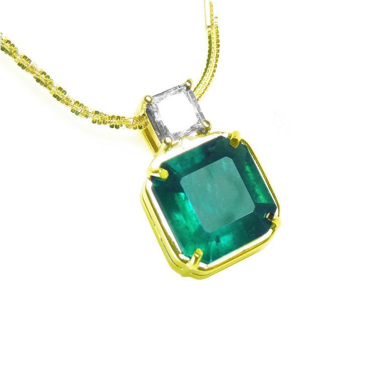 A women's emerald necklace fine jewelry, Asscher cut natural Colombian emerald is from the Muzo mines in Colombia.