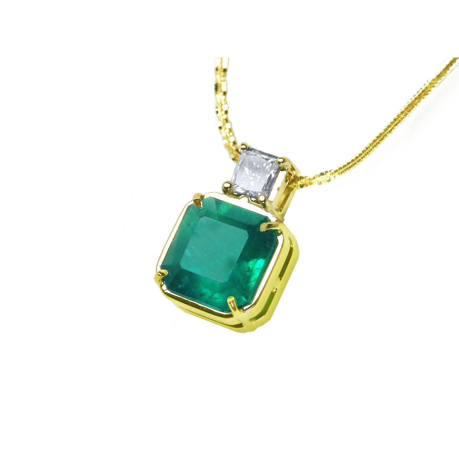 18K yellow gold necklace with a large asscher cut Colombian emerald and a princess cut diamond.