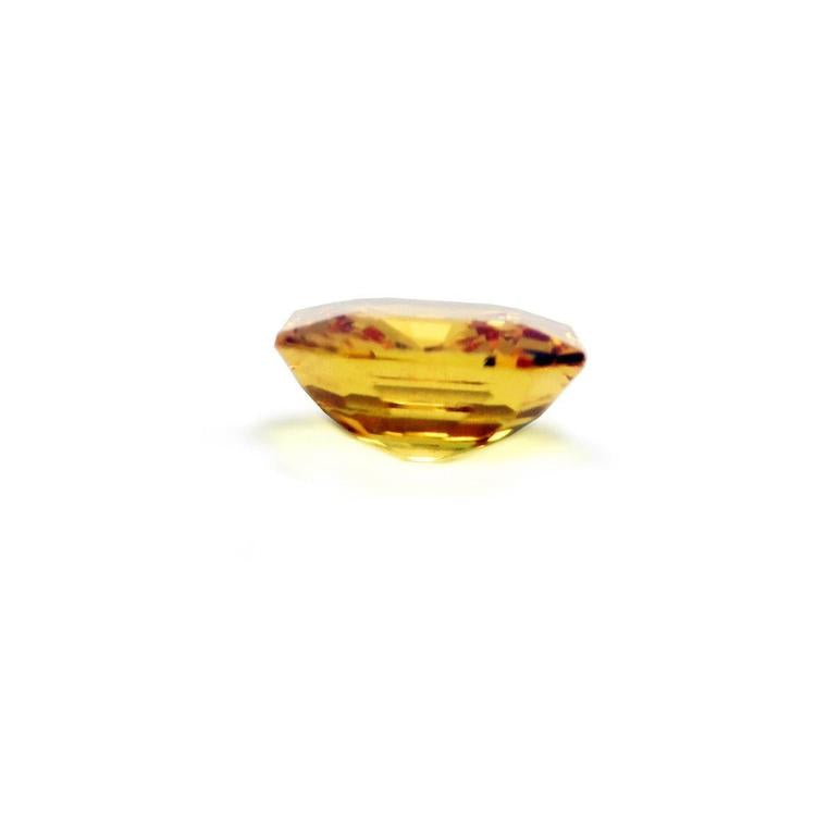 Asscher cut loose yellow sapphire natural gemstone, underside view girdle and pavilion visibles