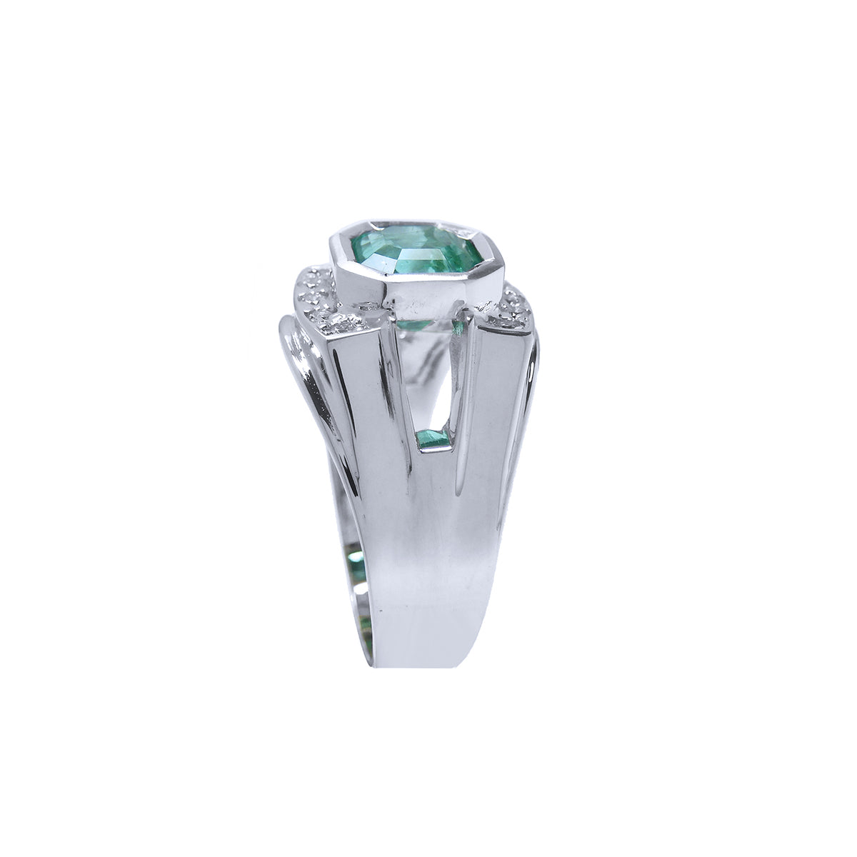 An emerald ring for men displaying the top and side band design in white gold.