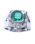 This asscher cut men's emerald ring in white gold with accent diamonds displays the top and sides profile.