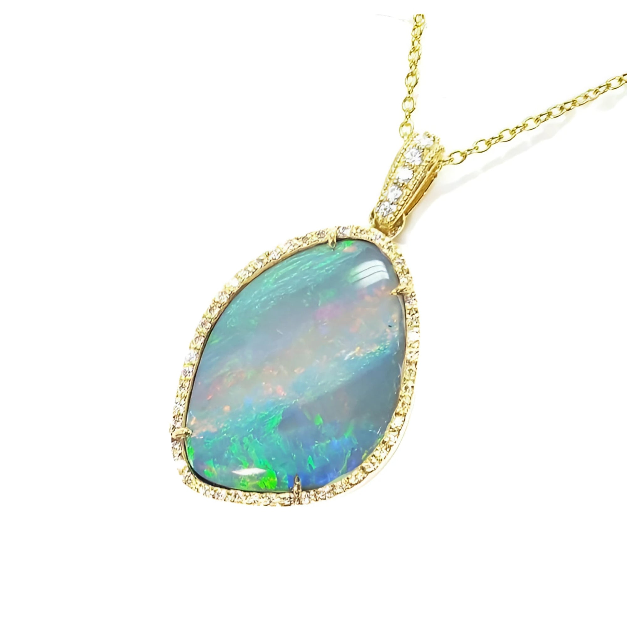 12.16 ct. Australian opal pendant with bluish-green play-of-color, set in 18K yellow gold with diamonds.