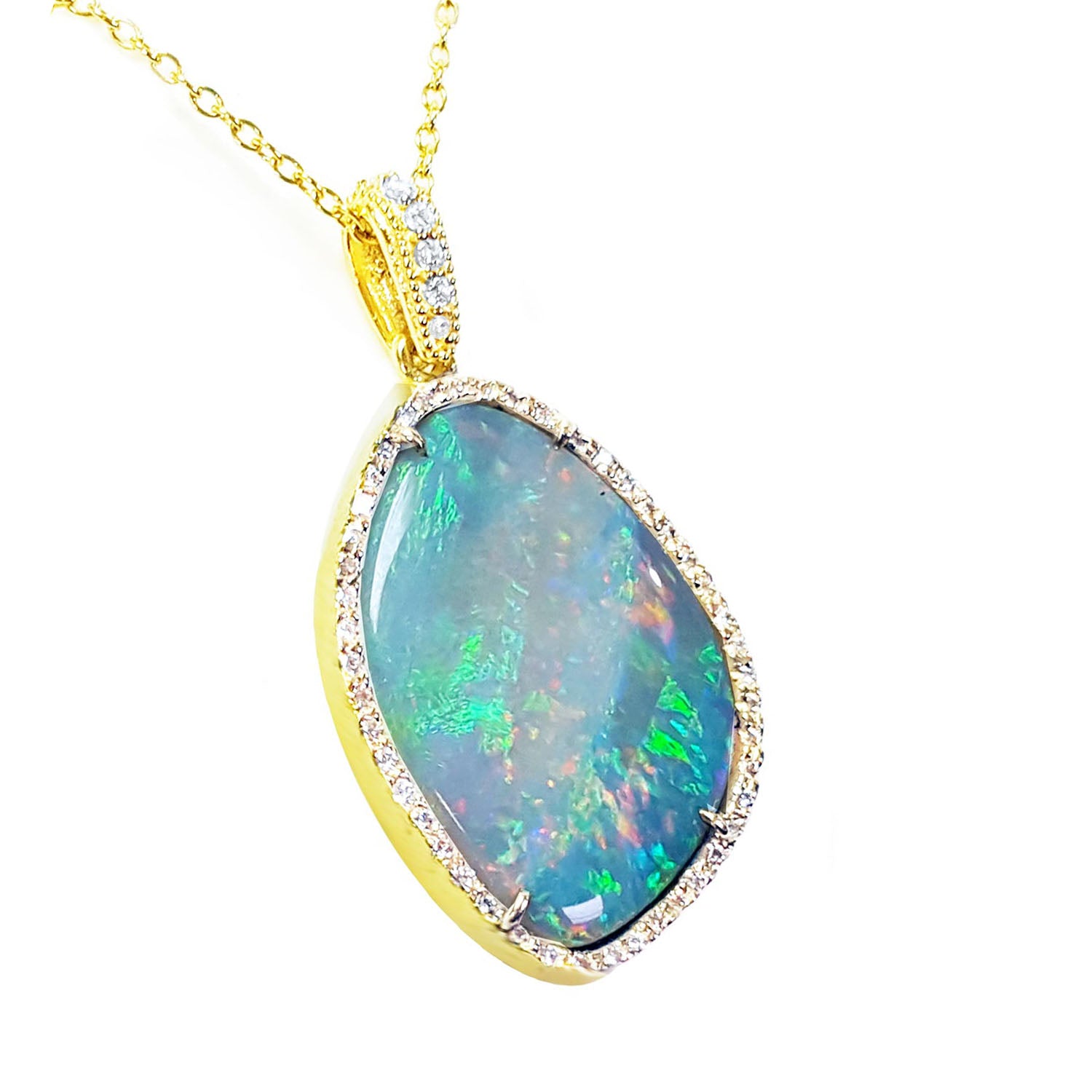 Opal pendant with gold and diamonds frame and chain on right side with top view profile.