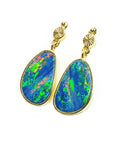 Opal earrings with gold setting on a top and left-side view profile