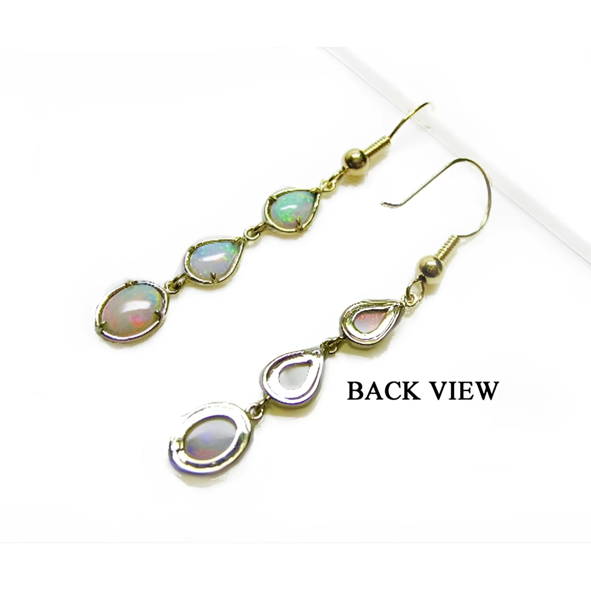 Back view of 14k yellow gold dangle earrings with three pear-shaped Australian opals.