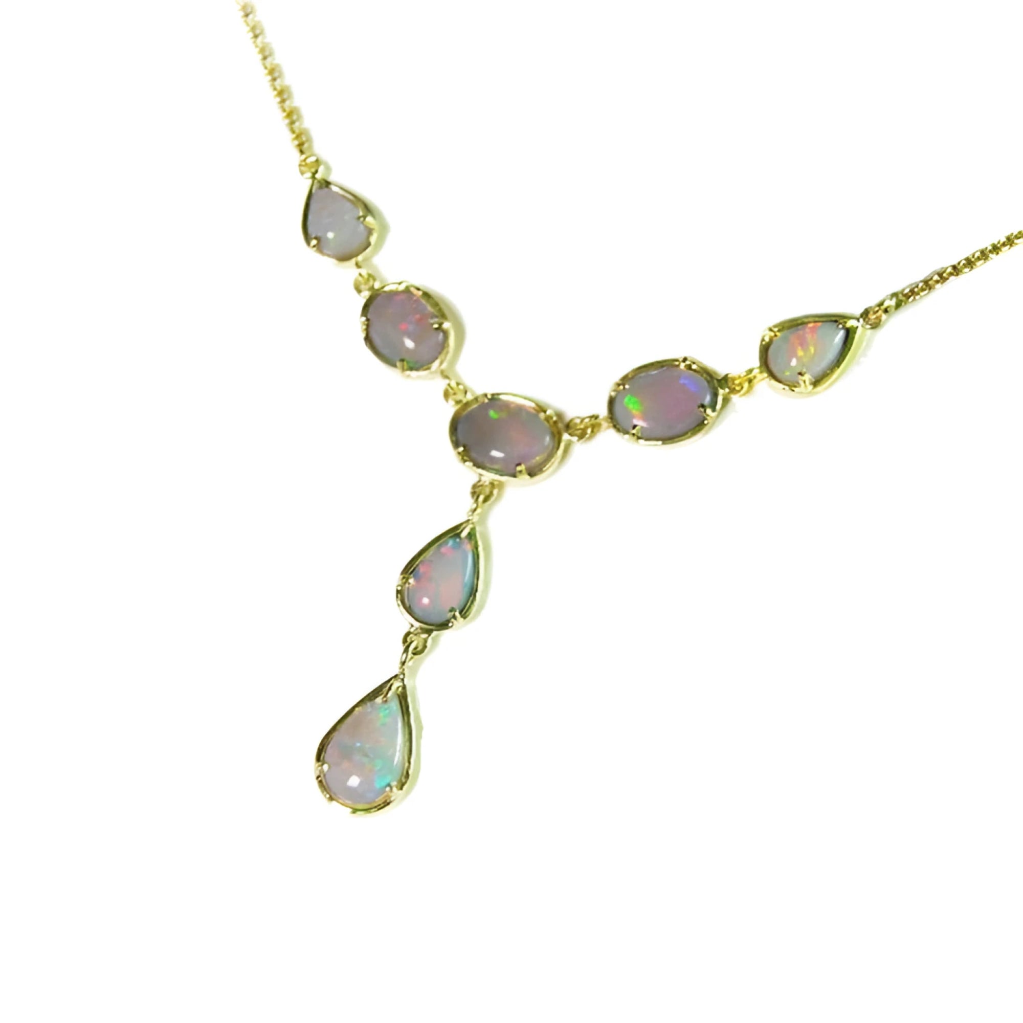 Handcrafted 14K yellow gold necklace with multiple Australian opal gemstones in oval and teardrop shapes.