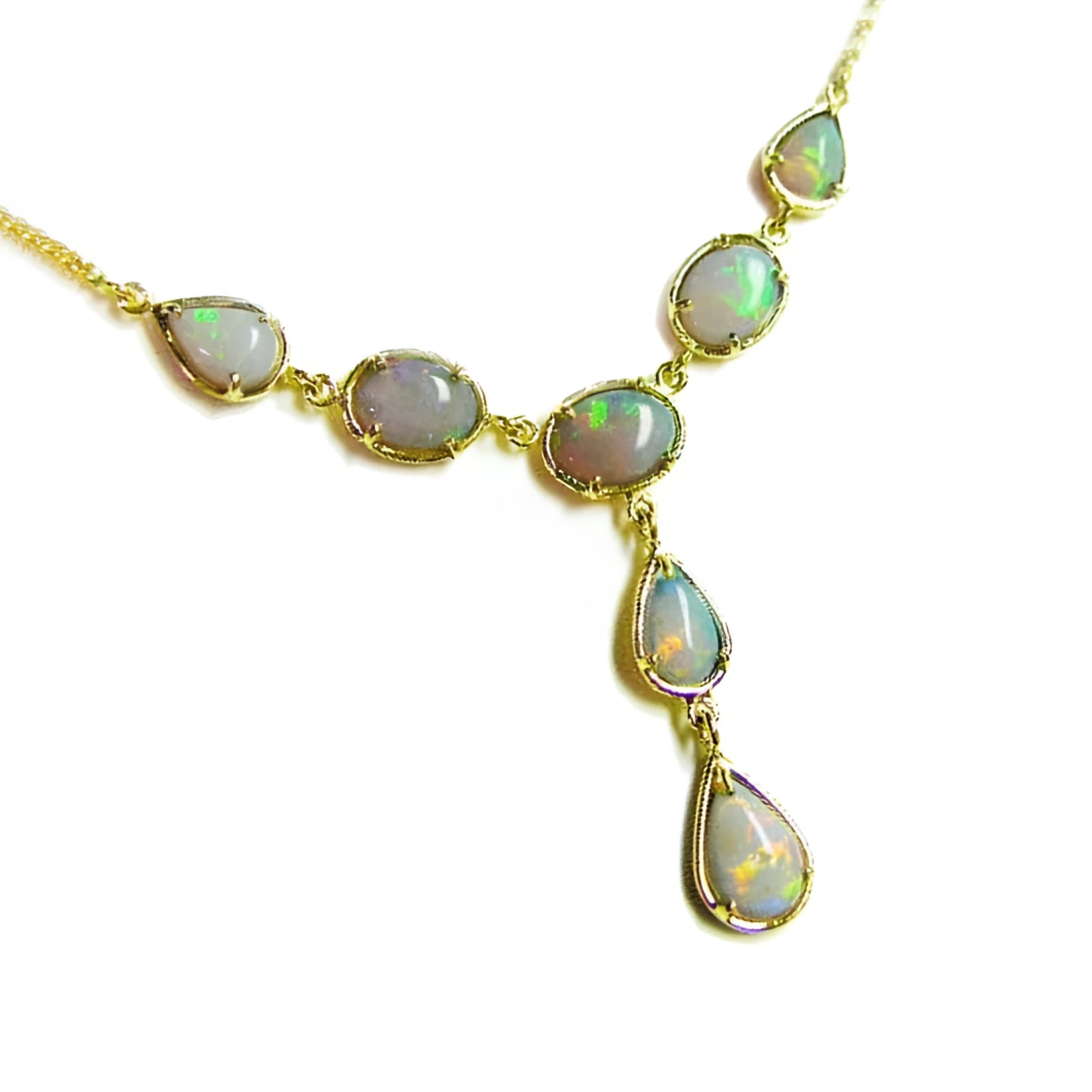 Handcrafted 14K yellow gold necklace with multiple iridescent Australian opal gemstones in oval and teardrop shapes.
