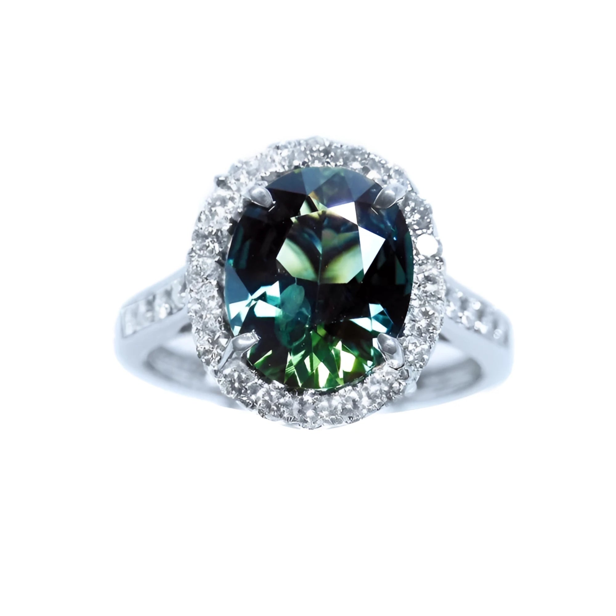 Australian sapphire ring for women oval cut with a sparkling bluish green hue, in a halo diamond crafted in 18K white gold. 