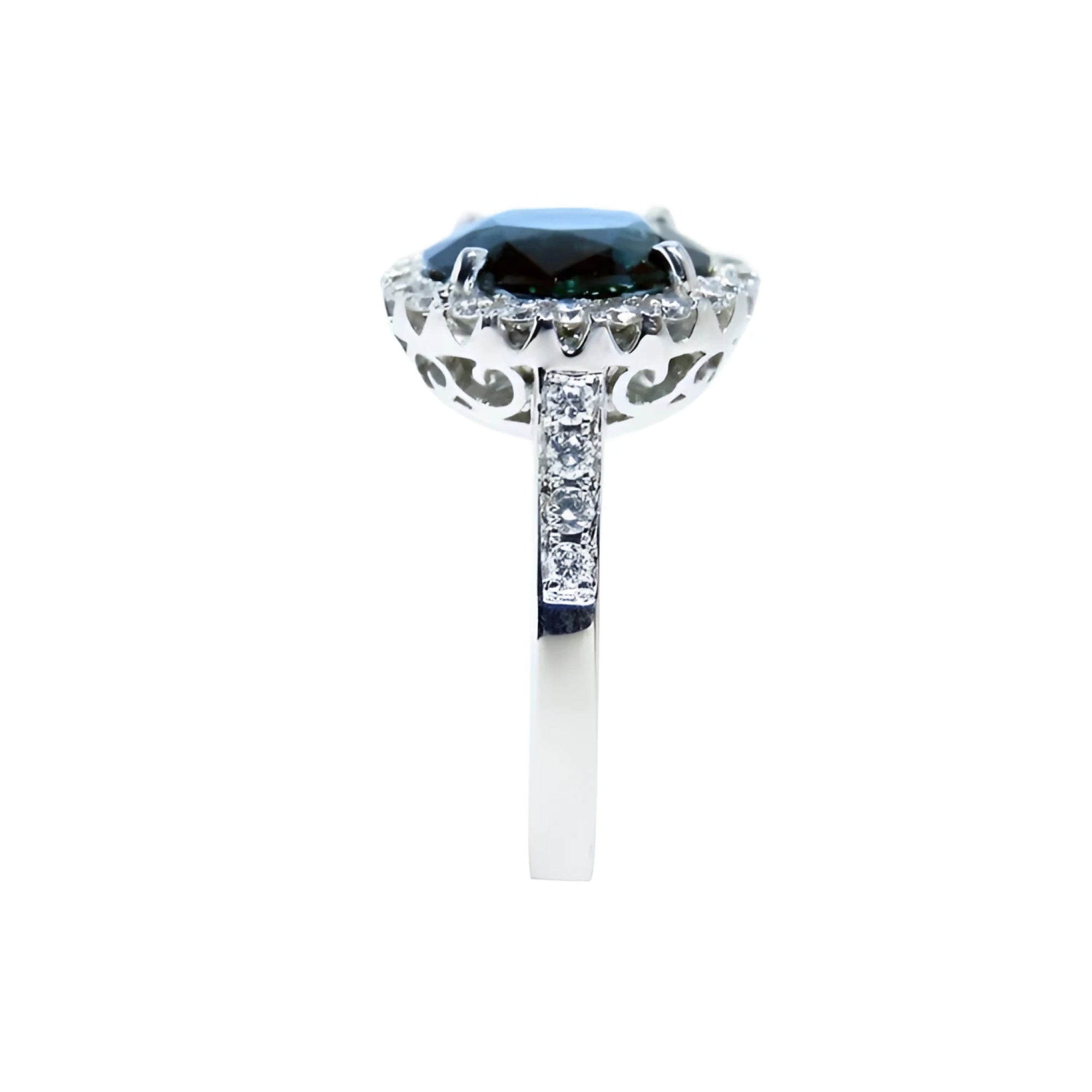 18K white gold ring with a large oval bluish-green Australian sapphire haloed by diamonds.