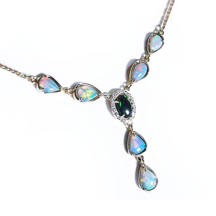 Necklace with opal stones on a white background