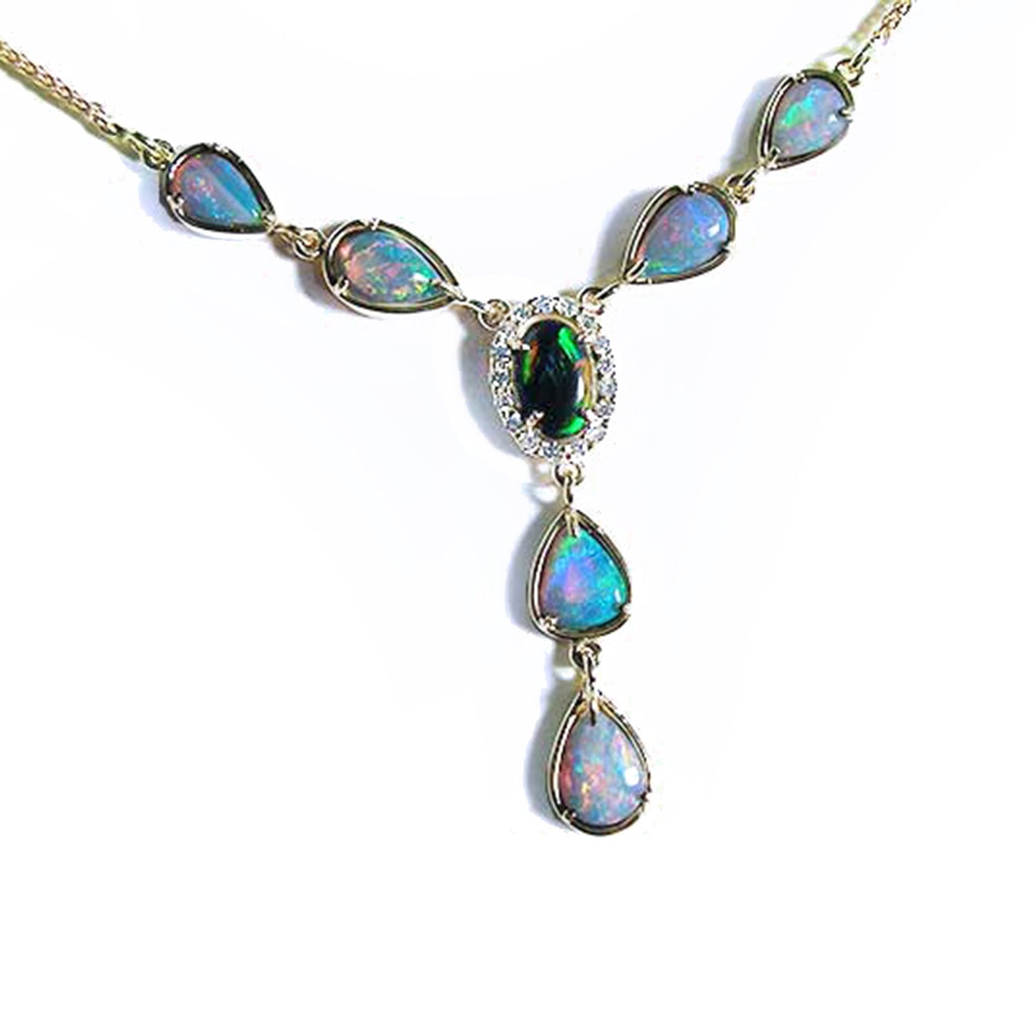 Opal necklace with a central green gemstone on a white background