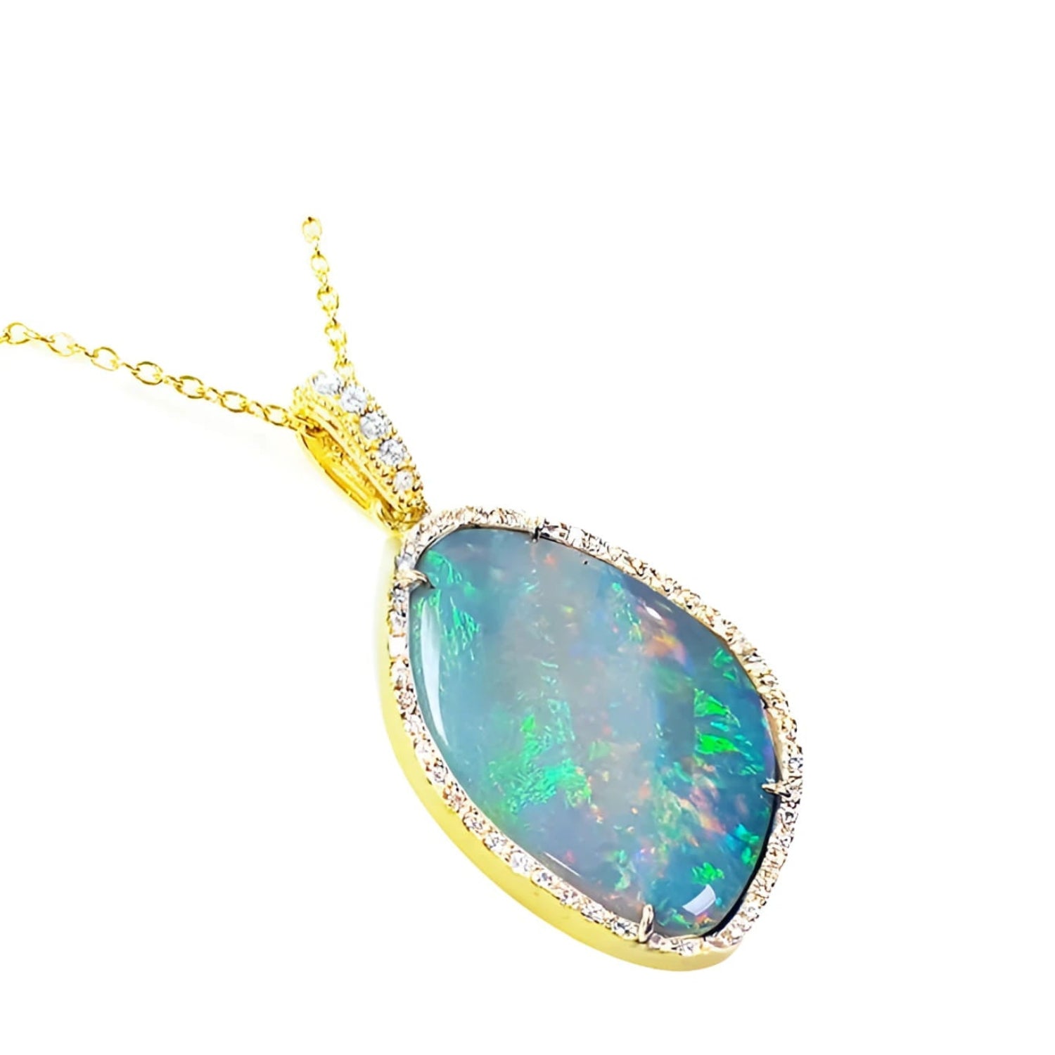 Exquisita colección de joyería en oro con ópalos australianos naturales y diamantes, diseñada para mujer.