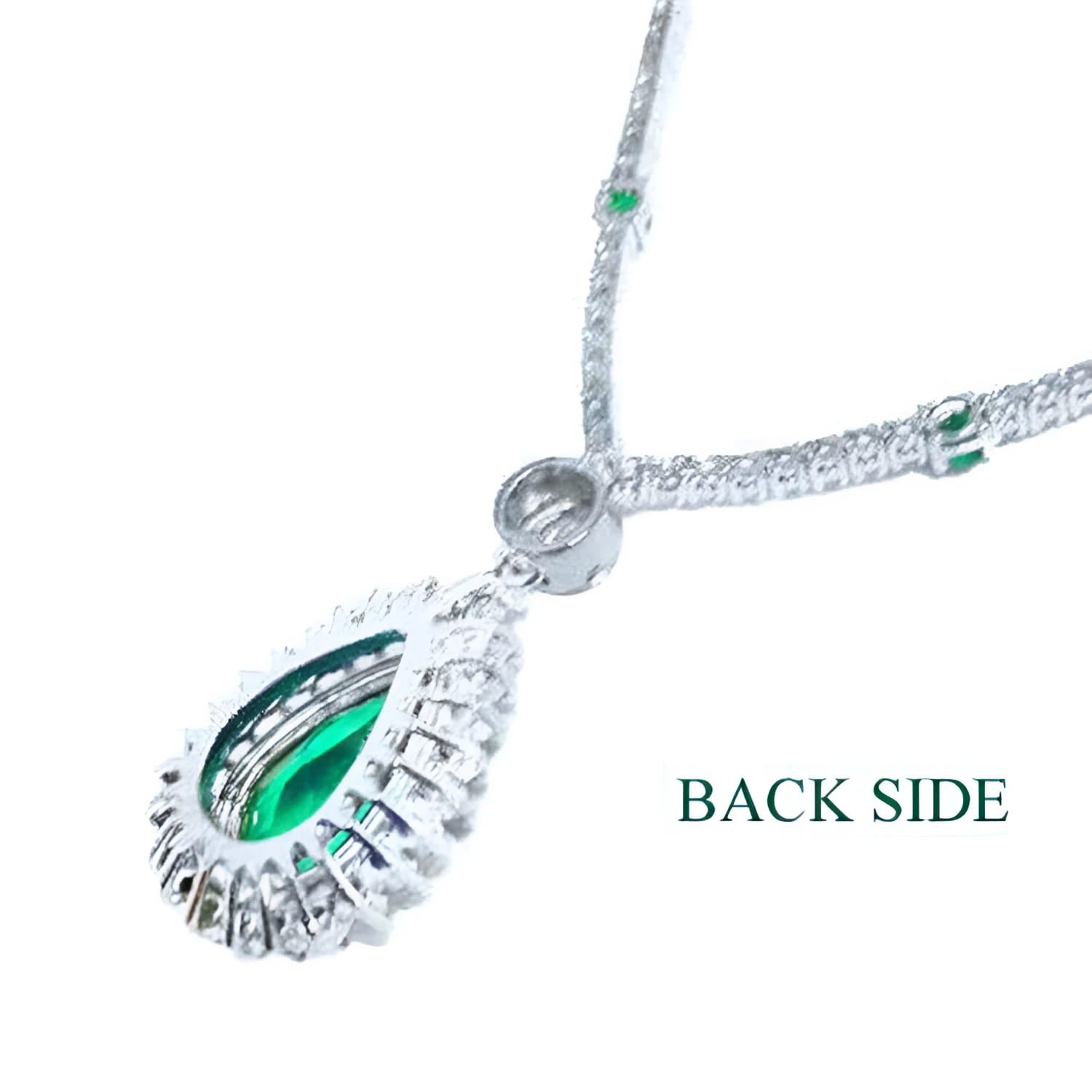 Back view of 18K white gold necklace with pear-cut emerald pendant and diamond halo.