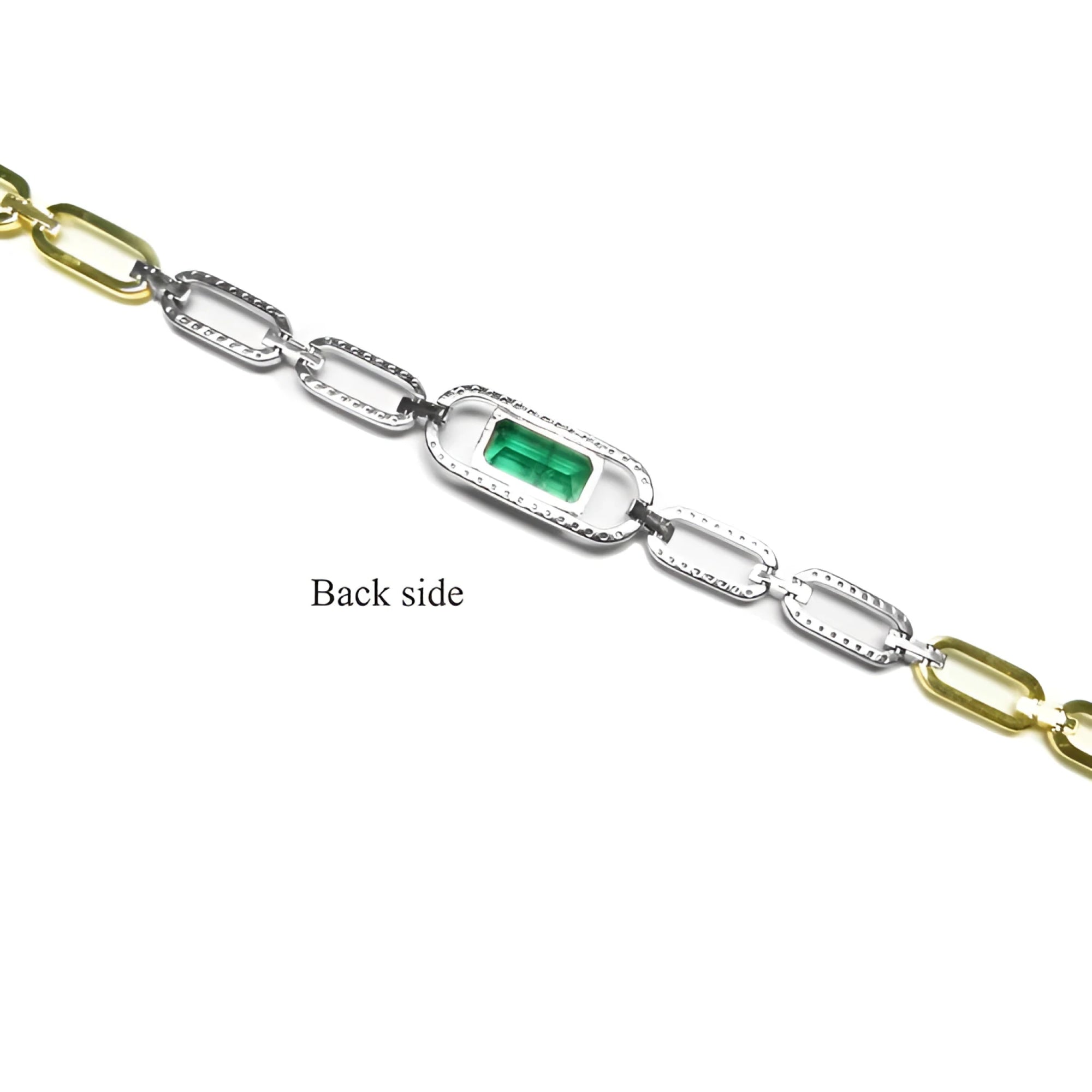 Back of 14K white and yellow gold paperclip bracelet with emerald-cut emerald.