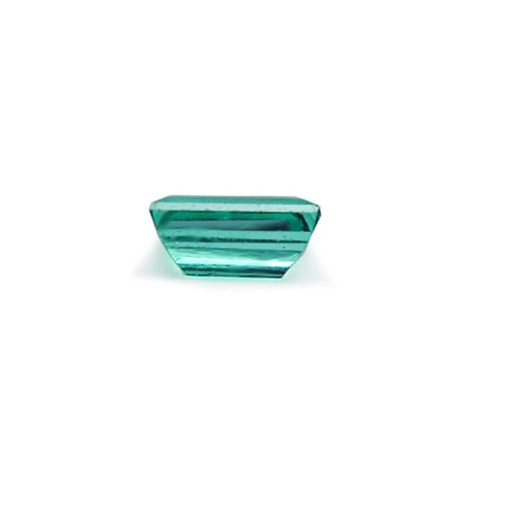 Baguette cut loose natural Colombian emerald, underside girdle and pavilion view