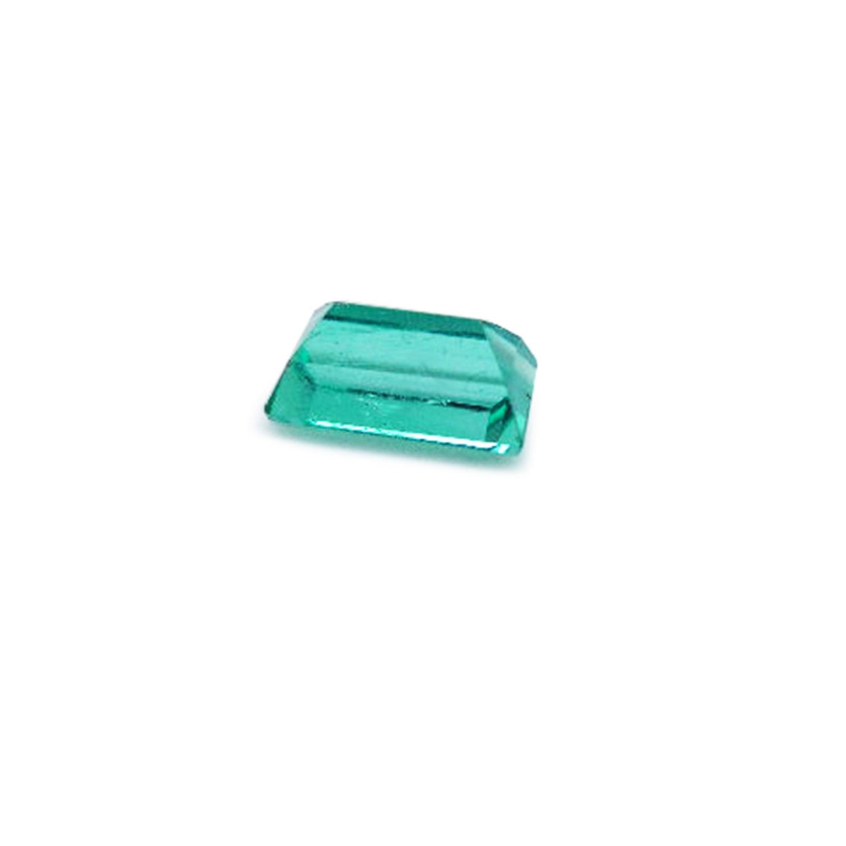 Baguette cut loose natural Colombian emerald, upside down pavilion view