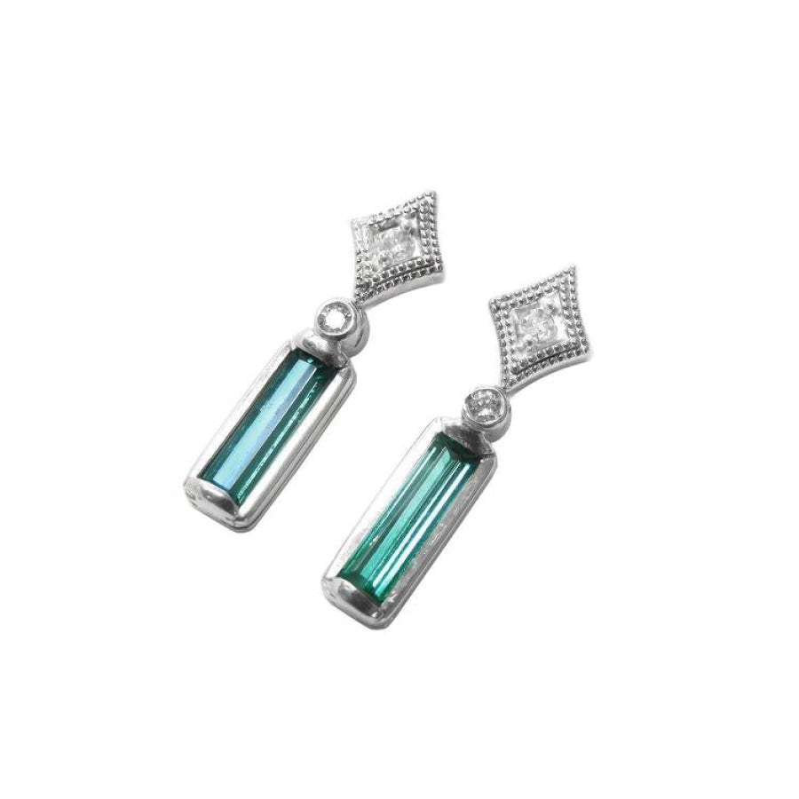 14K white gold emerald baguette and diamond stud drop earrings.
