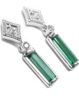 14k white gold baguette cut emerald earrings with accent diamonds on a right-side profile gallery view