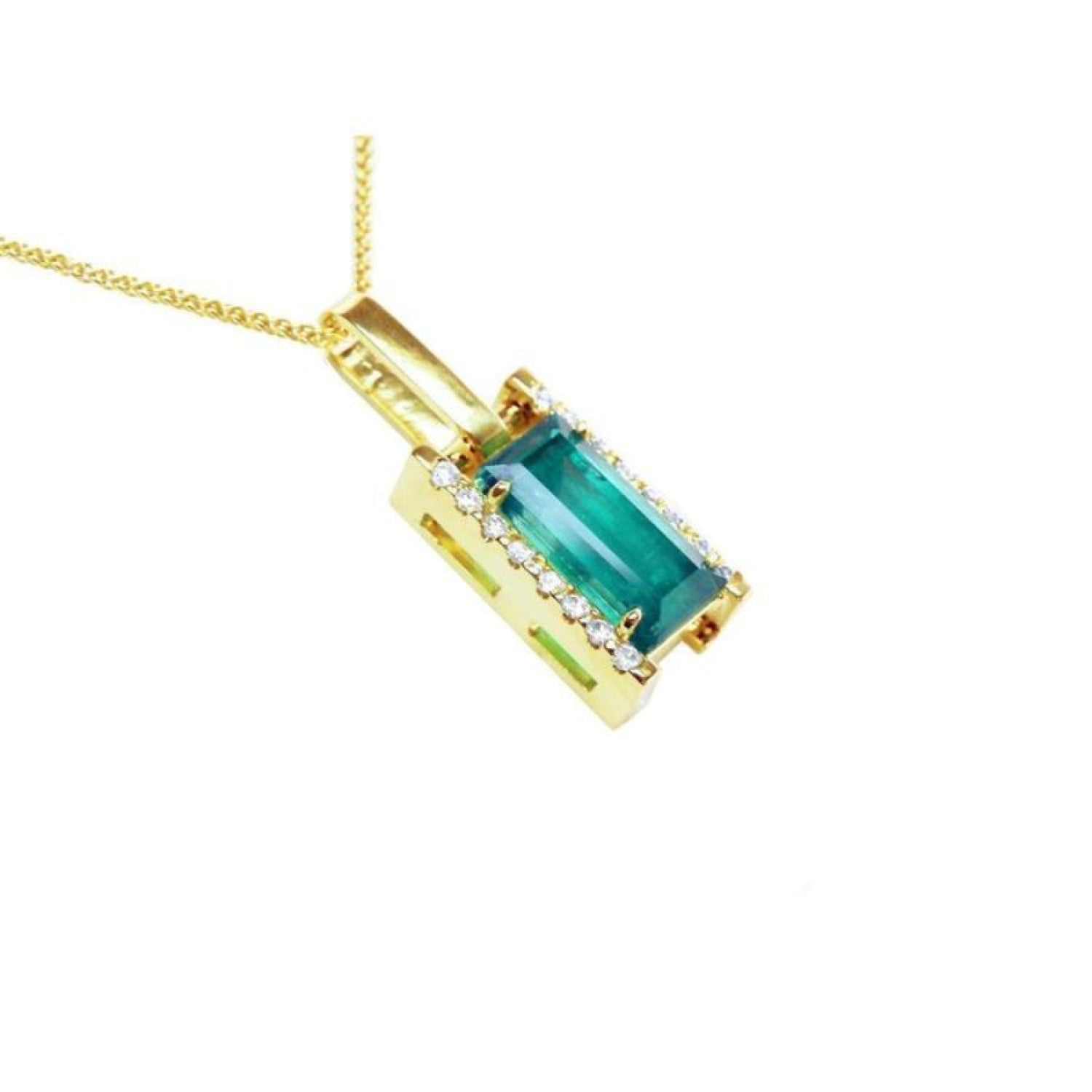 Baguette cut Colombian emerald pendant in 18K yellow gold with diamond accents on a delicate chain.