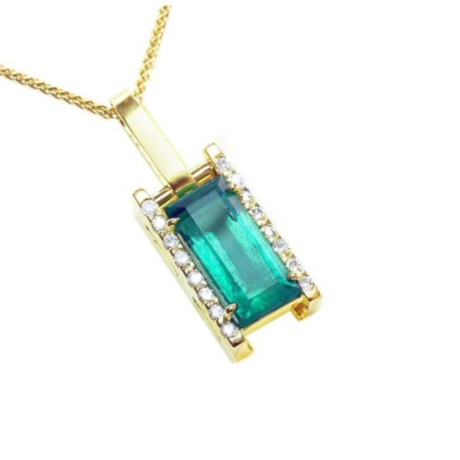 A 18k yellow gold baguette cut natural colombian emerald pendant with diamond accents.