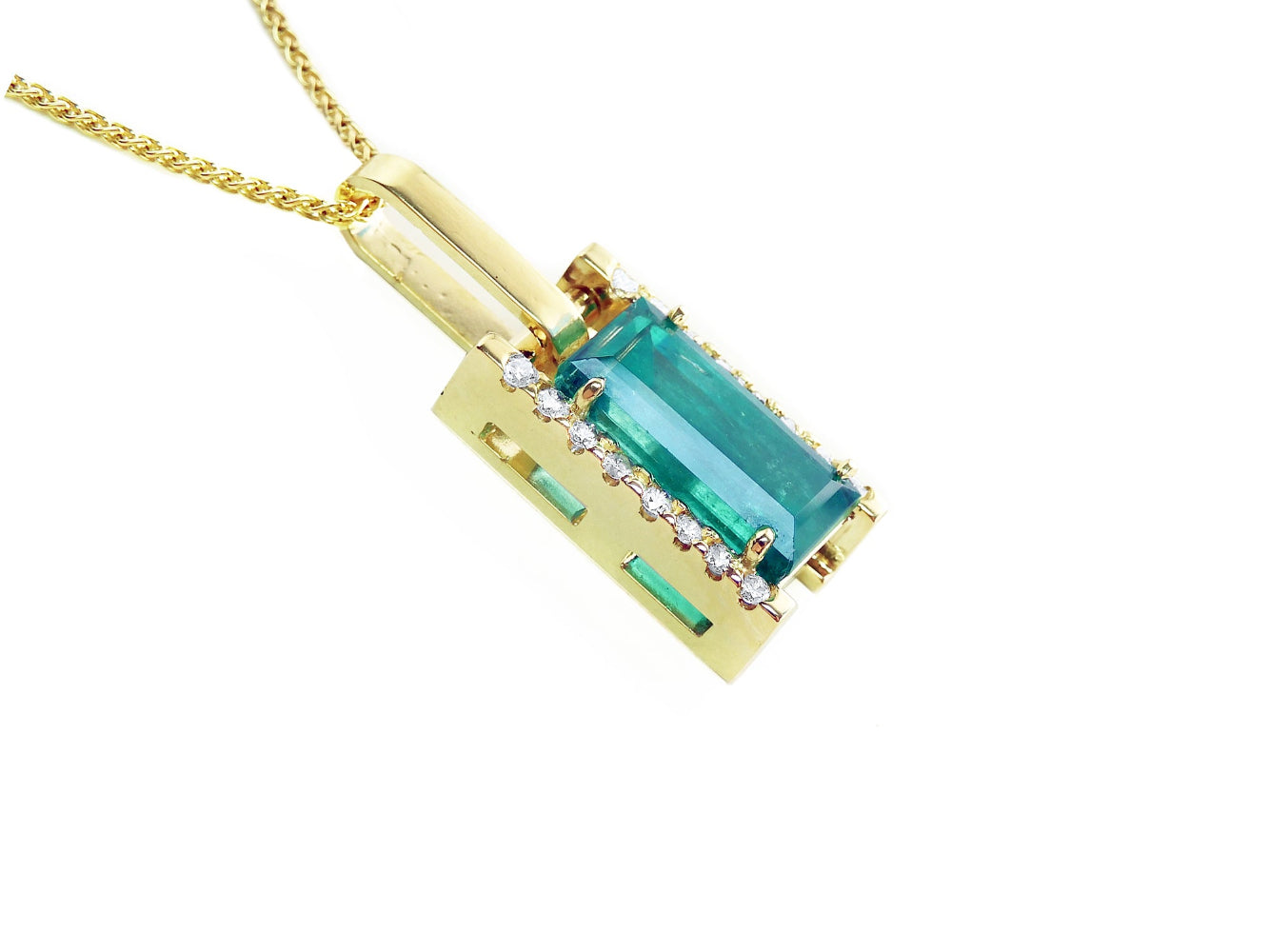 Right side profile emerald baguette pendant gallery visible.