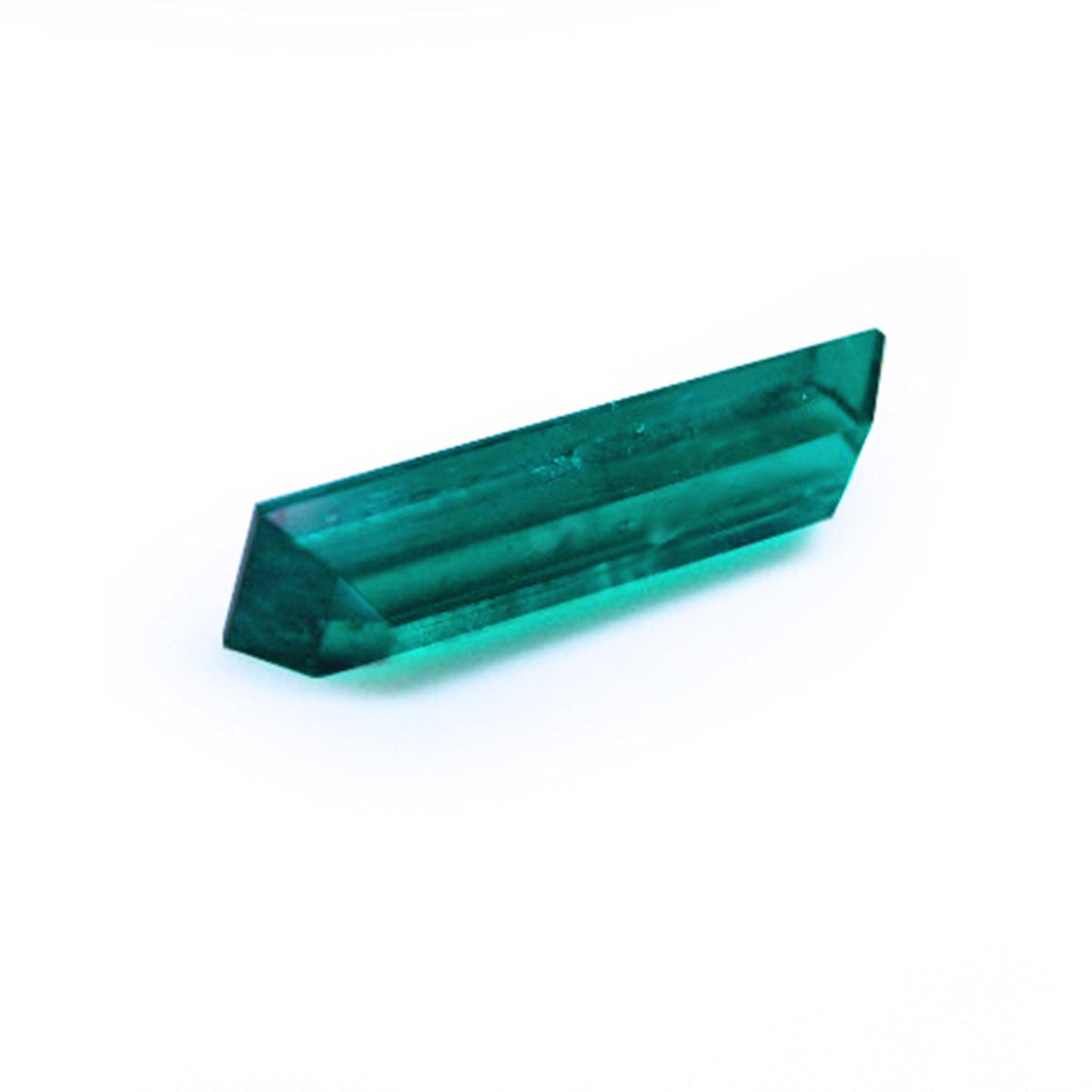 Baguette cut loose emerald for sale displaying underneath position