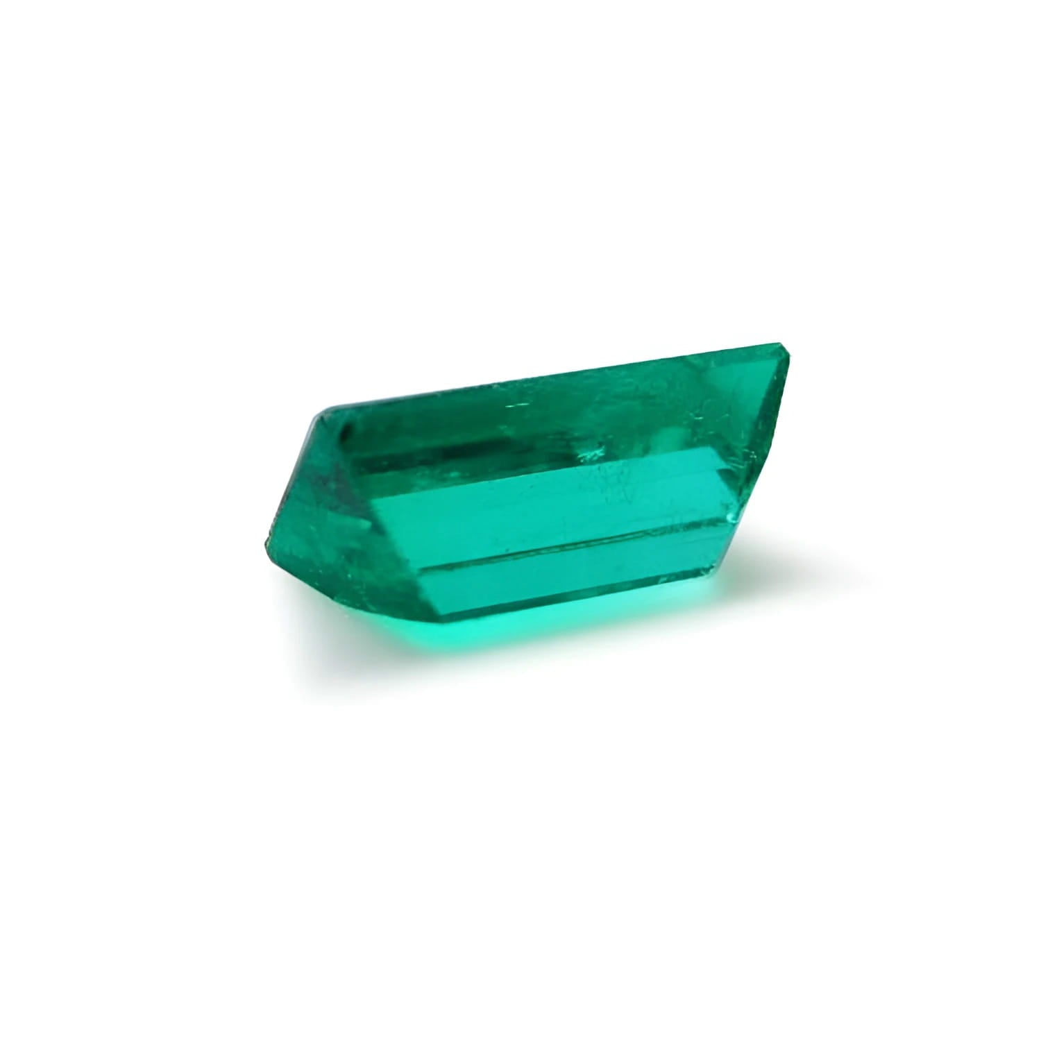 1.62 ct. baguette-cut loose natural emerald with a vibrant green hue.
